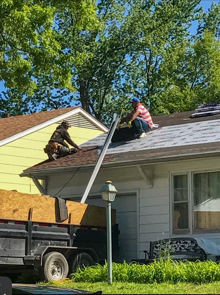 Hail-damaged roof inspection in Shawnee, KS
